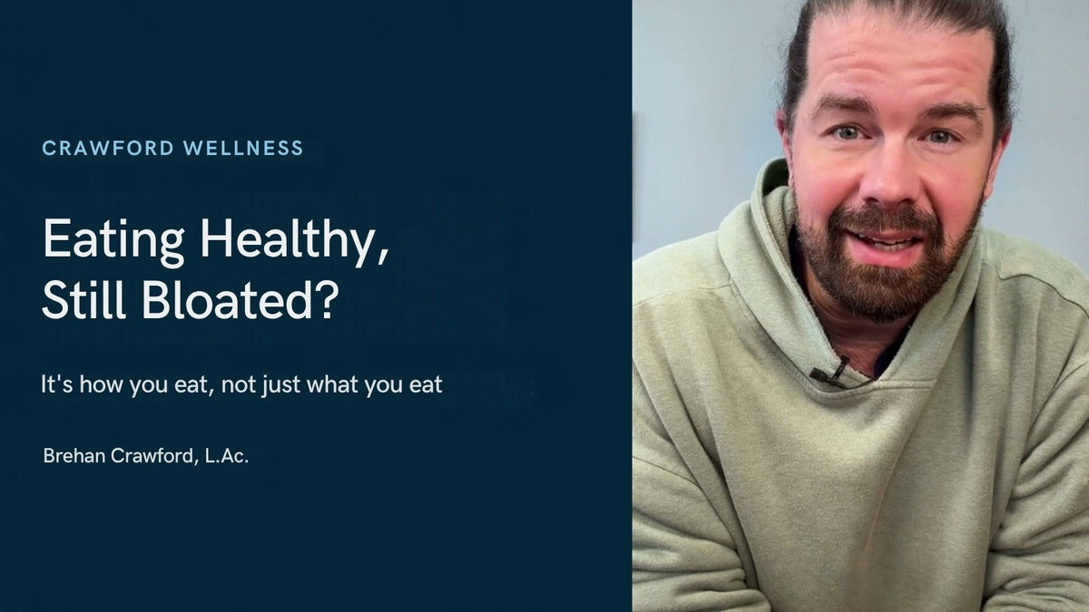 Why am I bloated when I eat healthy? Brehan Crawford, L.Ac., speaking to camera in a green hoodie
