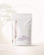 White tea package with a feather design on a white background