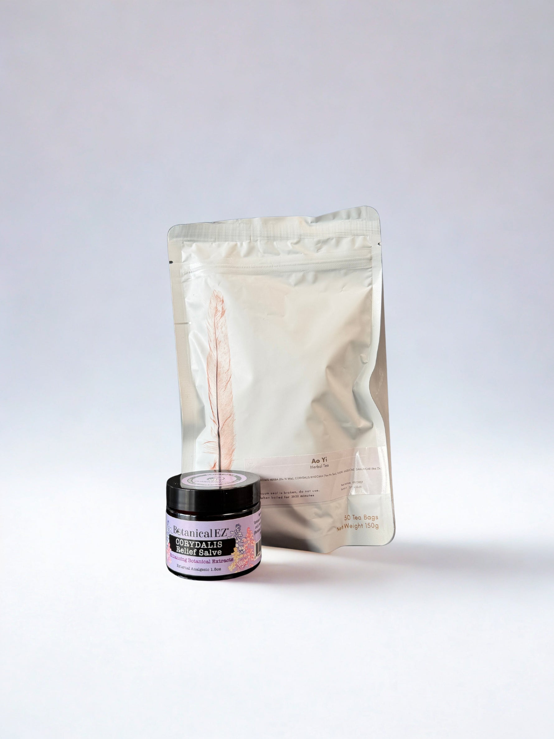 Cosmetic packaging including a jar and a large pouch on a white background