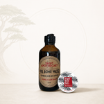 Bottle of Saint Apothecary Evil Bone Water with a smaller container labeled 'Dragon Blood' on a white background.