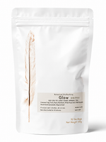 Glow herbal tea (Gui Zhi Fu Ling Tang) from Crawford Wellness, with a white label, in a white stand-up pouch on a plain white background.