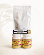 Collection of natural health products including a pouch, bottles, and a tube on a white background