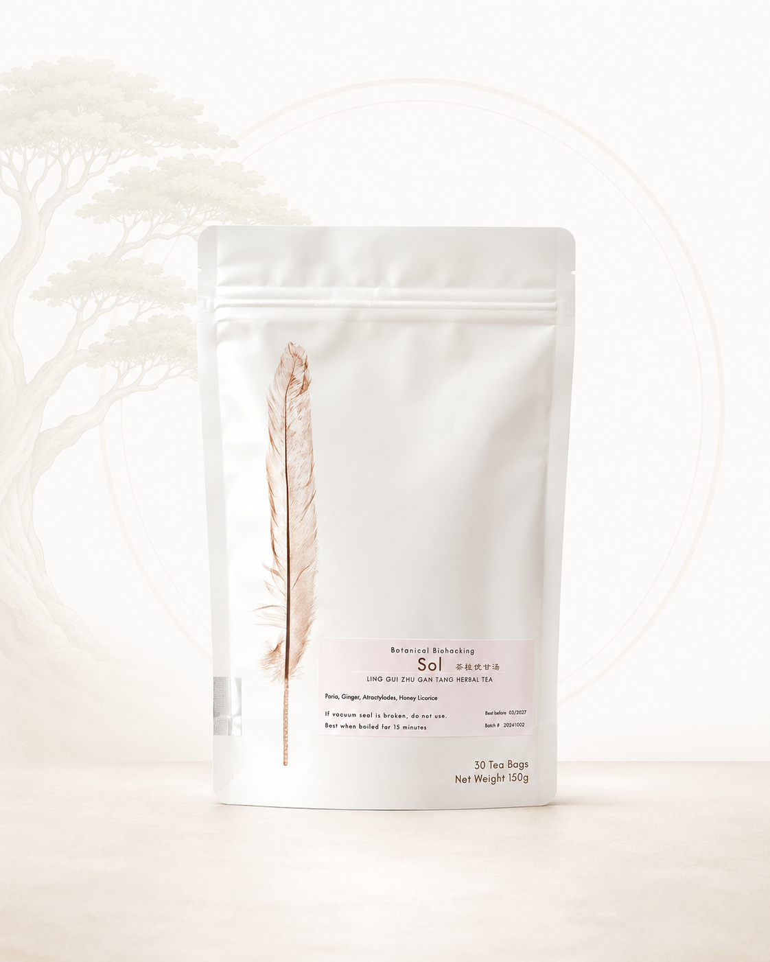 White tea packaging with a feather design on a white background